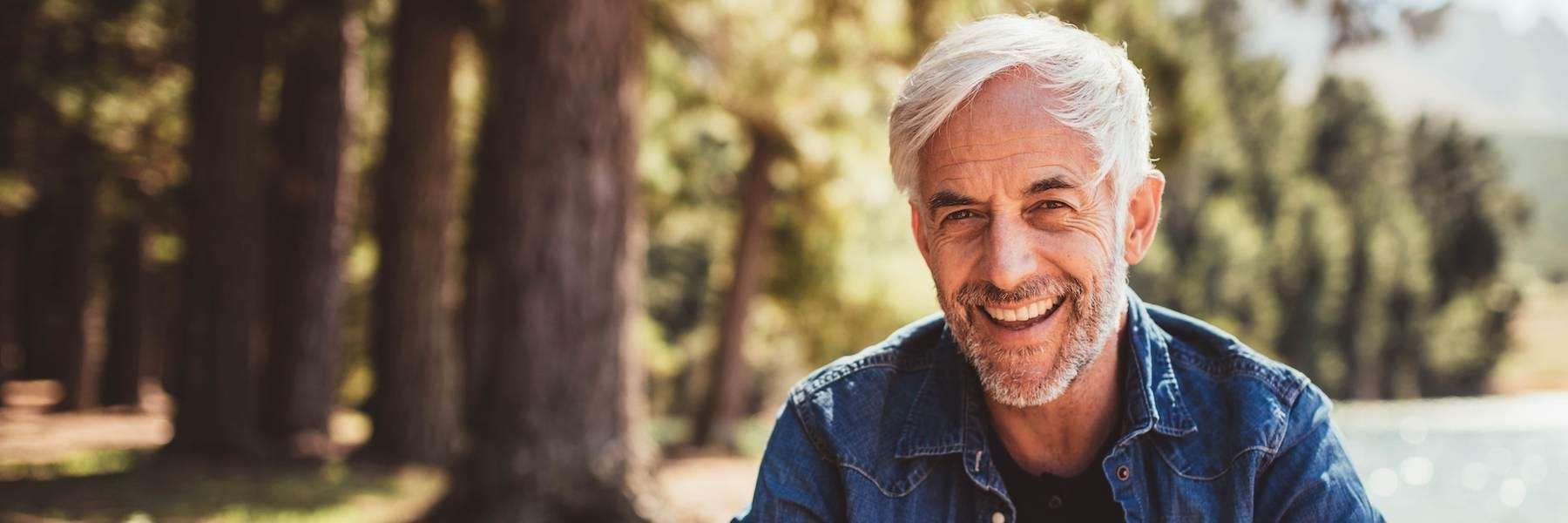 Coeur d’Alene man smiling after getting dental implants