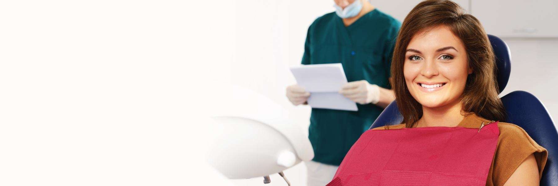 woman smiling after a gentle dental extraction in sandpoint