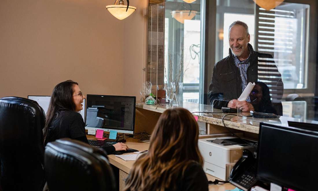 Patient is welcomed by friendly front desk staff