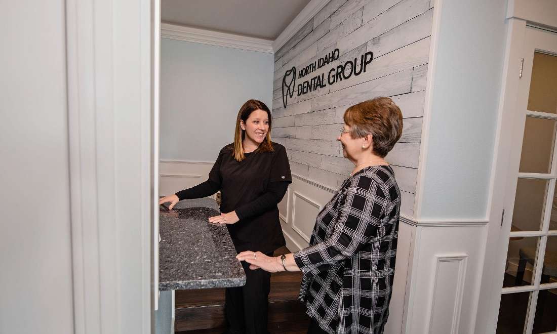 staff member talking to patient